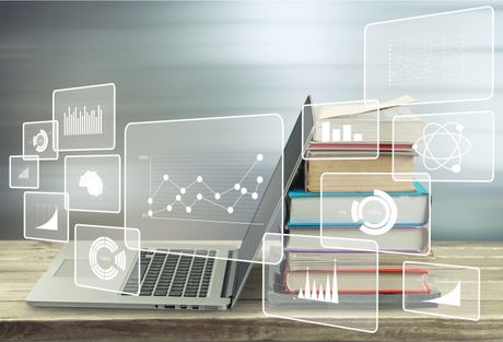 stack books with laptop