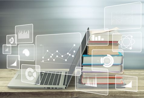 stack books with laptop