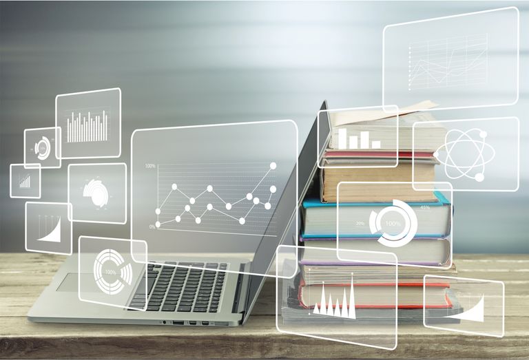 stack books with laptop